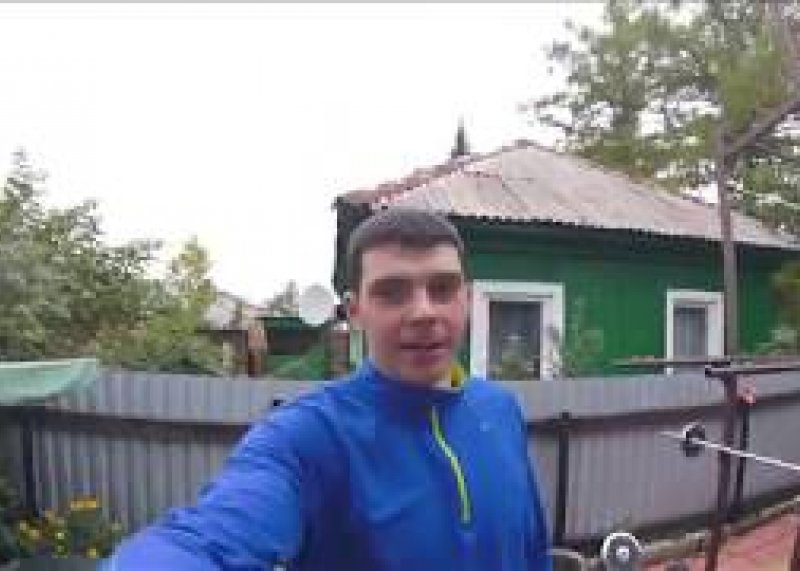 Подтягивания на кольцах с 16 кг гирей